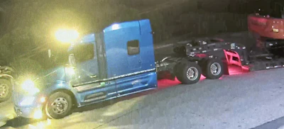 Security footage from the Southern Tire Mart at Pilot's shop showed the blue truck driving away with Miceli's trailer and load.