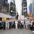 A large group of Einride employees gather in Times Square to celebrate the company's Nasdaq debut.