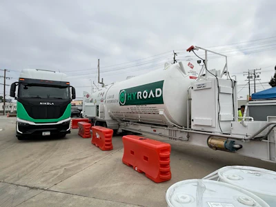 A Nikola Tre fuel cell electric (FCEV) semi-truck acquired by Hyroad Energy parked beside a mobile hydrogen refueling station in Southern California.