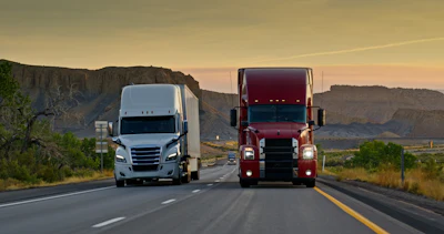 Two Trucks Driving Across Utah