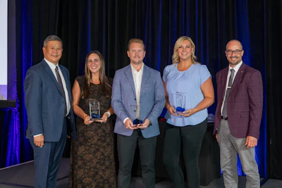 From left: CVSN President Edward Kuo, Jenna Karczewski of VIPAR Heavy Duty, Luke Masters of UAP, Paige Johnson of SKF, and Ian Johnston, CVSN Chairman recognize the GenNext 4 Under 40 Award winners Friday at the CVSN Summit in Montreal.