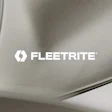 Fleetrite logo on metallic vehicle component surface