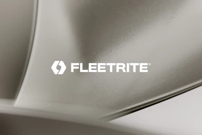 Fleetrite logo on metallic vehicle component surface