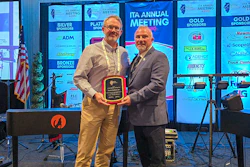 Eric Pettigrew is presented the Illinois Trucking Association Allied Member of the Year Award on behalf of Truck Centers Inc.