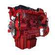Red Cummins diesel engine with black cylinder head and mechanical components on white background