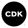 CDK Global logo featuring white letters on black circular background