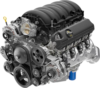 Detailed cutaway illustration of an automotive engine showing internal components, intake manifold, and mechanical assembly
