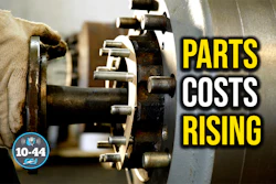 Mechanic holding industrial brake assembly with text overlay stating 'Parts Costs Rising'