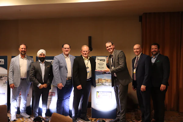Rush Truck Centers is presented the 2026 Successful Dealer Award Tuesday in Nashville.