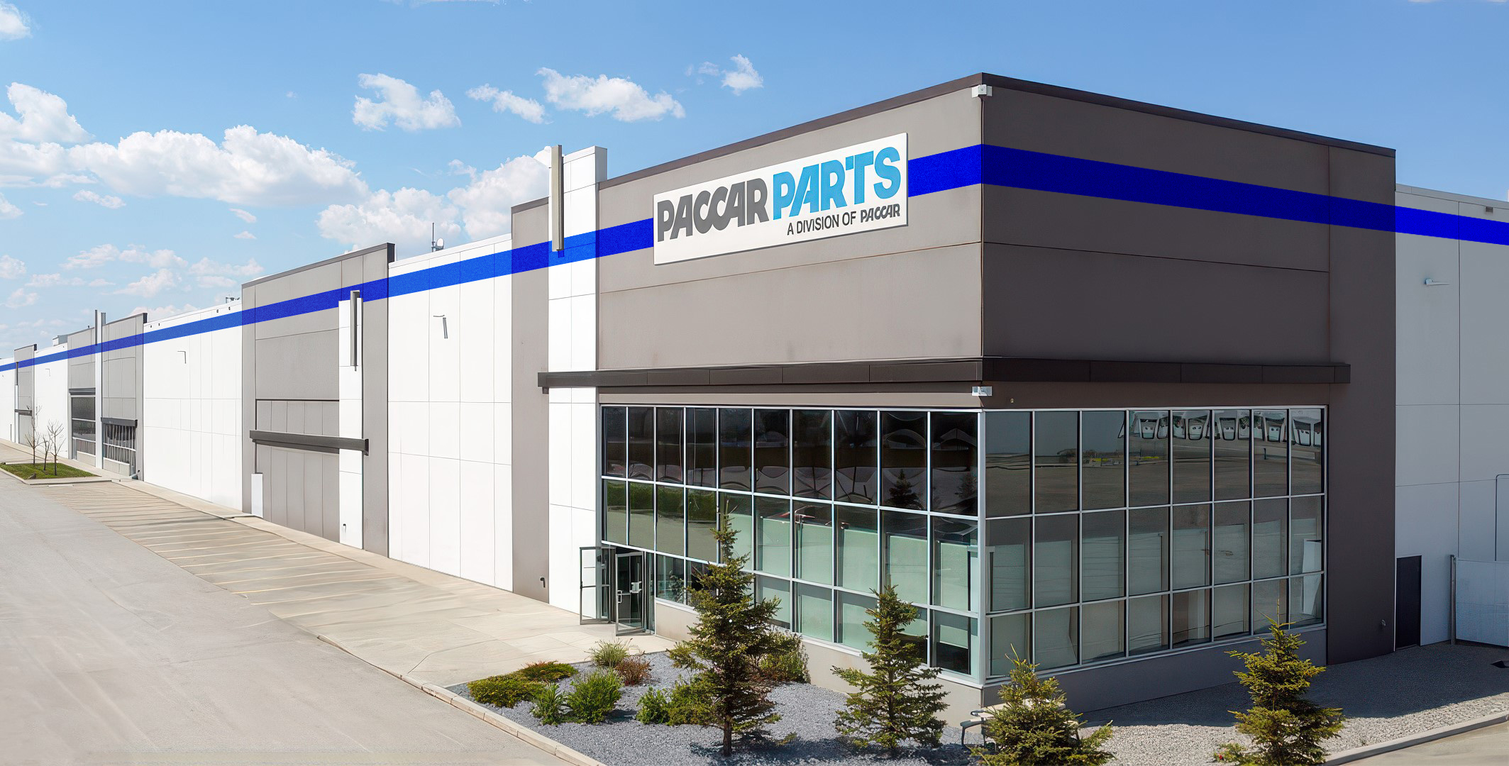 PACCAR Parts modern warehouse facility with blue and white branding on gray industrial building exterior