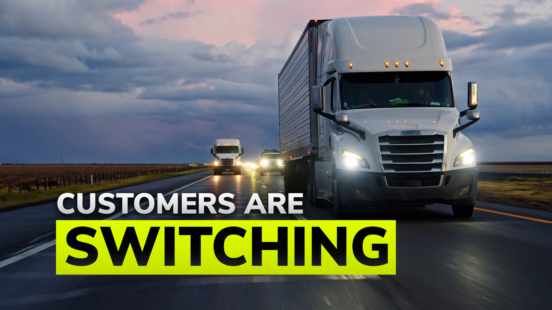 Commercial trucks driving on highway at sunset with text overlay reading 'Customers are switching'