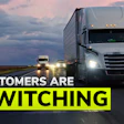 Commercial trucks driving on highway at sunset with text overlay reading 'Customers are switching'
