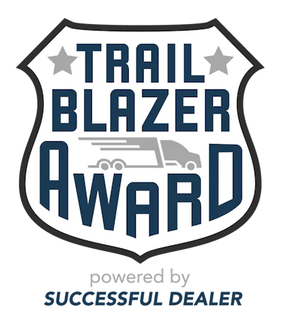 Trail Blazer Award logo featuring a shield badge with RV icon, powered by Successful Dealer